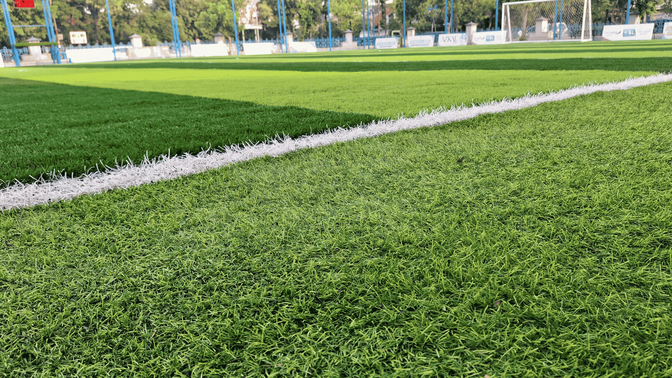 Turf athletic field representing preseason sports training and nutrition for athletes preparing for two-a-day practices and intense workouts.